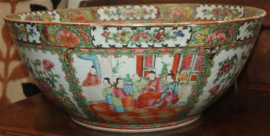 A  famille rose punch bowl and a similar bottle vase and cover